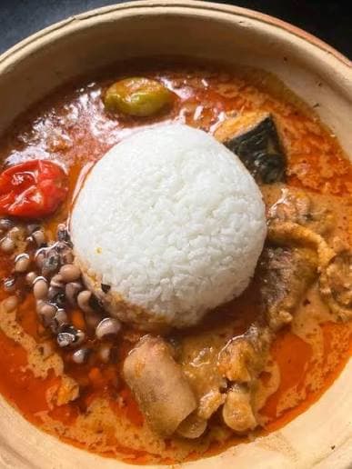 Rice Balls & Groundnut Soup (Ɔmotuo)